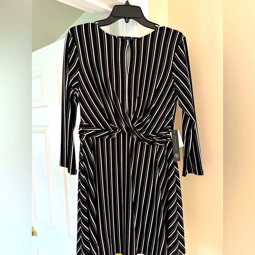Size large, with tags.  Black and white striped design.